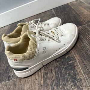 On White and Tan Sneakers